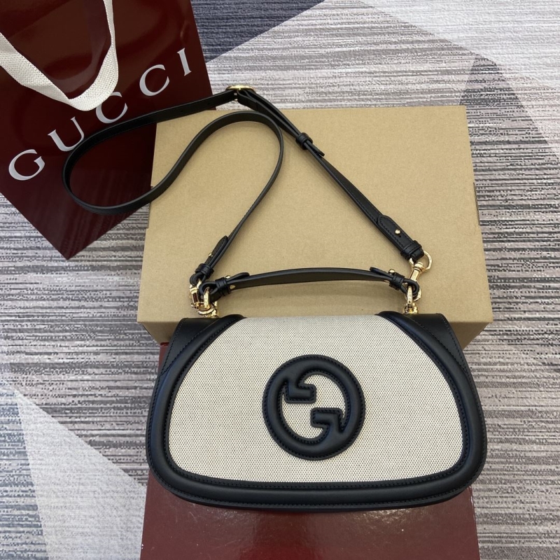 G*u*i top handle bags
